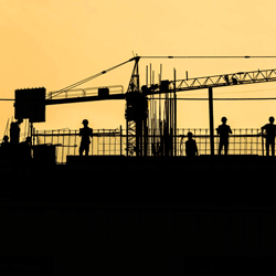 Construction Workers in Silhouette. Photo Credit: Shivendu Shukla on Unsplash [https://unsplash.com/photos/3yoTPuYR9ZY]