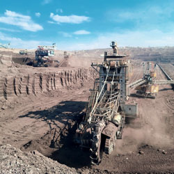DFW Labor Market Update. Mining Equipment. Photo Credit: Albert Hyseni on Unsplash [https://unsplash.com/photos/qq8eWIreIgg]