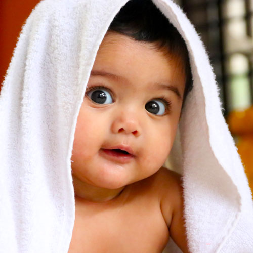 A Baby. Photo Credit: Nihal Karkala on Unsplash [https://unsplash.com/photos/UvZzgPeDl60]