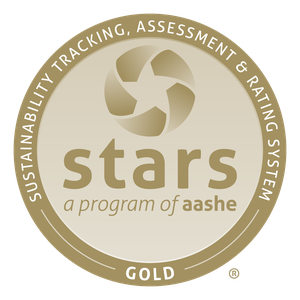 The badge of a Sustainability Tracking, Assessment & Rating System Gold-Level Institution, by the Association for the Advancement of Sustainability in Higher Education.