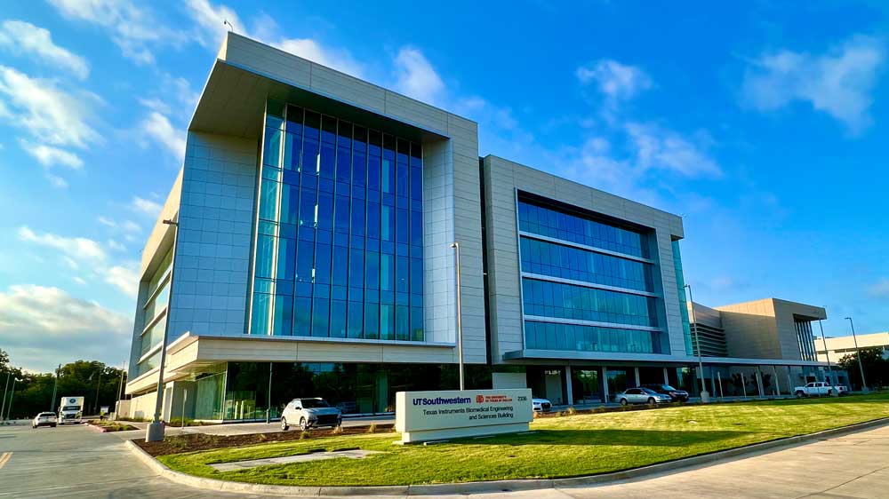 The Texas Instruments Biomedical Engineering & Sciences Building, a modern glass and stone structure.