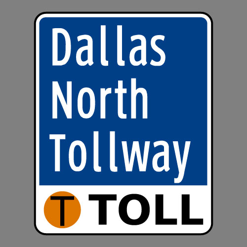 A Dallas North Tollway Sign. Photo Credit: Public Domain 2016 Freddie [https://commons.wikimedia.org/wiki/File:Toll_Texas_Dallas_North_Tollway.svg]