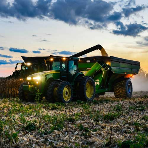 The Connection. A tractor harvesting corn in Bartlett, Texas. Photo Credit: Samantha Amidon on Unsplash [https://unsplash.com/photos/a-tractor-is-driving-through-a-field-at-sunset-i3VLYuyZXx0]