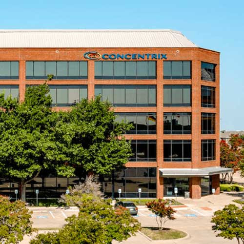 The five-story brick and glass building at 17787 Waterview Parkway. Photo Credit: Avison Young