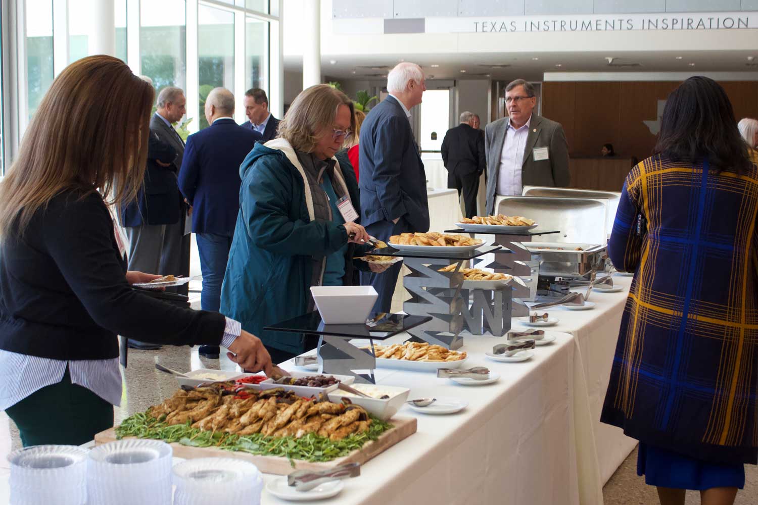 Networking around the buffet.