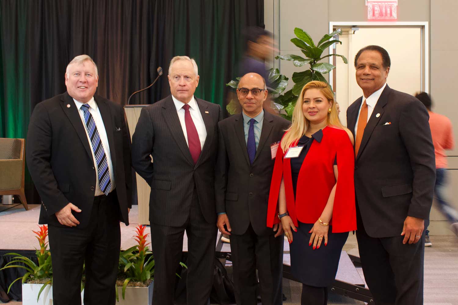 Sharing a moment between panels. From left: Dr. Richard C. Benson, president for The University of Texas at Dallas; Mr. Ross Perot Jr., chairman of The Perot Companies and Hillwood; Koushik Venkataraman, director of Workforce Development for Texas Instruments; Rose Hasham, principal of Axe Commercial Real Estate; and Dr. Calvin D. Jamison, vice president for Facilities & Economic Development.