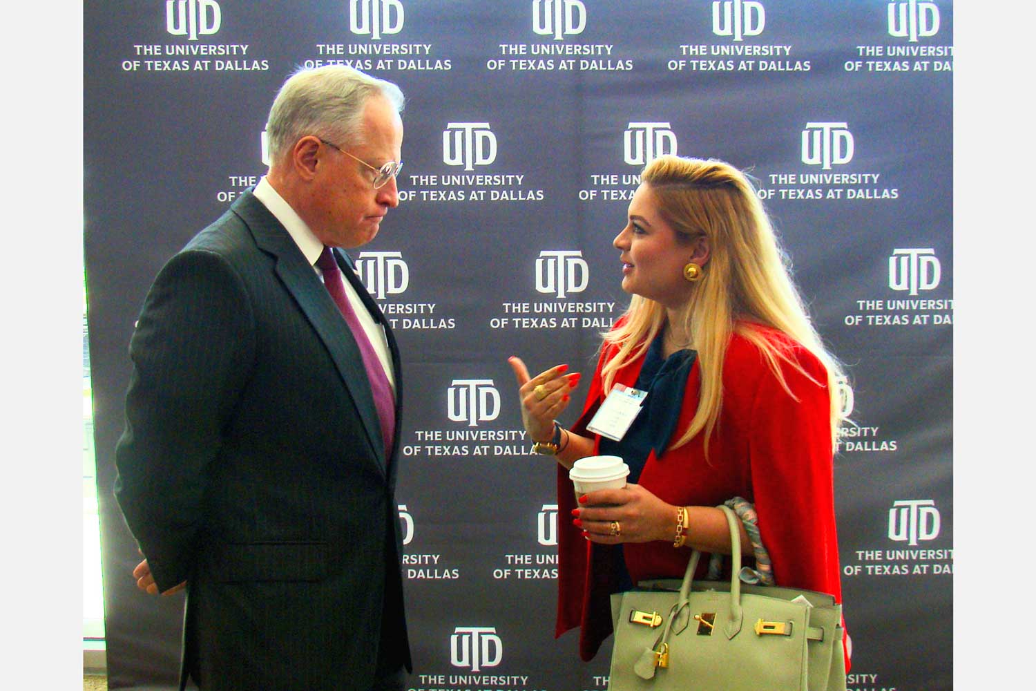 From left: Mr. Ross Perot Jr., chairman of The Perot Companies and Hillwood, in conversation with Rose Hasham, principal of Axe Commercial Real Estate.